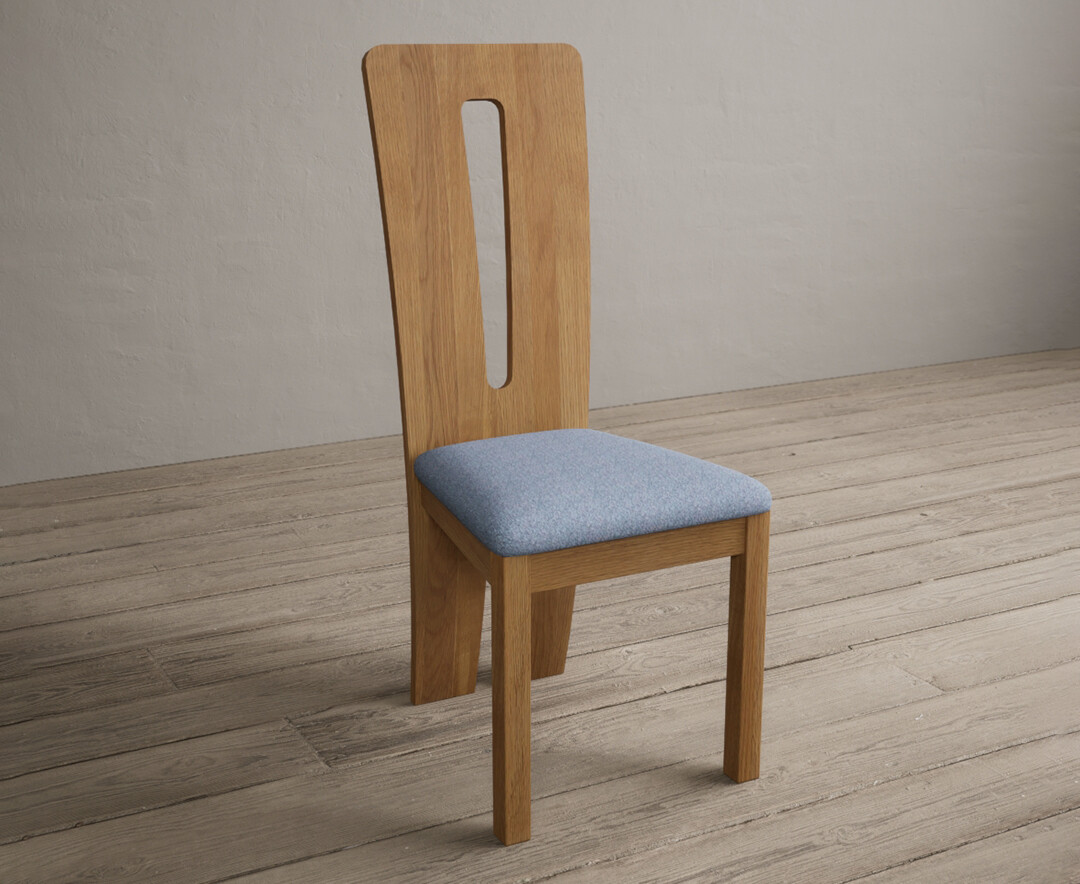 Photo 1 of Lucca solid oak dining chairs with blue fabric seat pad