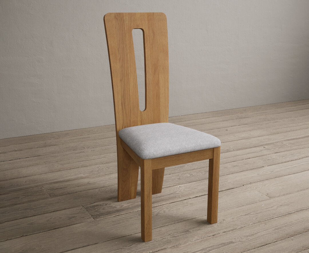 Photo 1 of Lucca solid oak dining chairs with light grey fabric seat pad