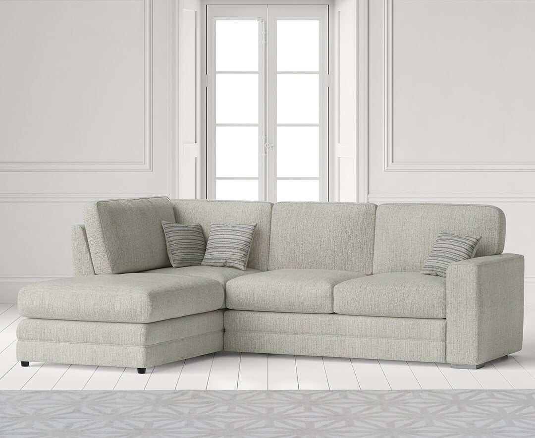Product photograph of Madden Ivory Fabric Left Hand Facing Corner Sofa from Oak Furniture Superstore