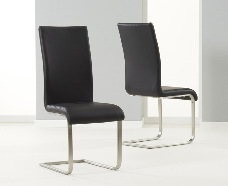 Product photograph of Austin Black Faux Leather Dining Chairs from Oak Furniture Superstore