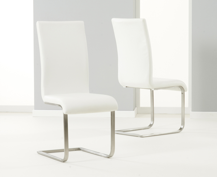 Photo 1 of Malaga white faux leather dining chairs