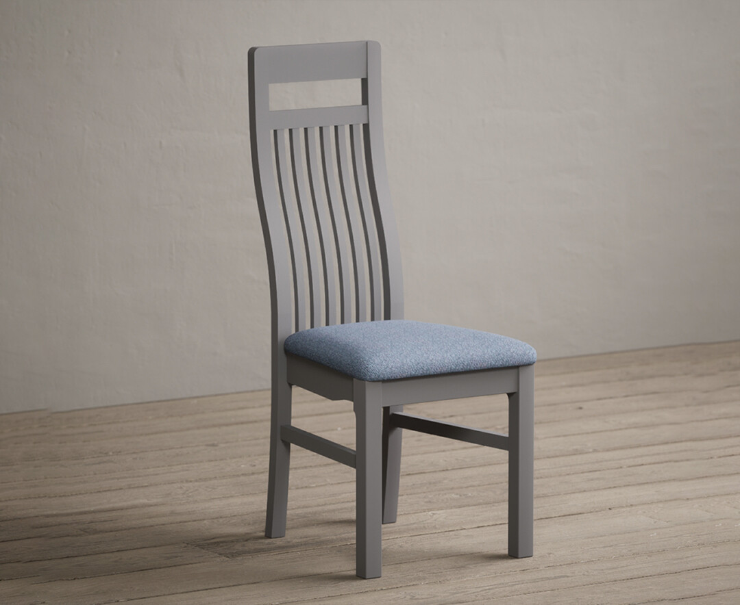 Photo 1 of Monroe light grey painted dining chairs with blue fabric seat pad