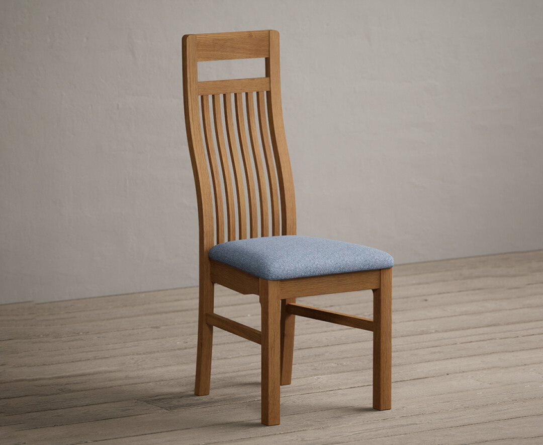 Product photograph of Monroe Solid Oak Dining Chairs With Blue Fabric Seat Pad from Oak Furniture Superstore.