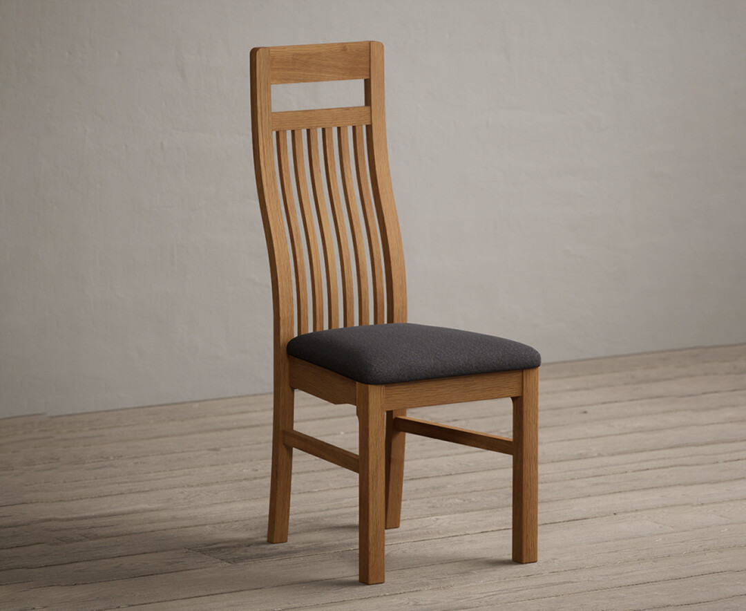 Product photograph of Monroe Solid Oak Dining Chairs With Charcoal Grey Fabric Seat Pad from Oak Furniture Superstore.