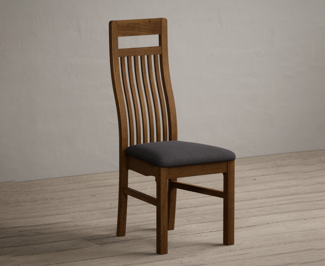 Product photograph of Monroe Rustic Oak Dining Chairs With Charcoal Grey Fabric Seat Pad from Oak Furniture Superstore.