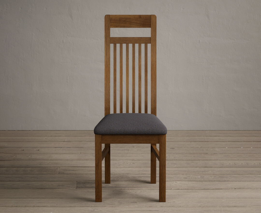Product photograph of Monroe Rustic Oak Dining Chairs With Charcoal Grey Fabric Seat Pad from Oak Furniture Superstore