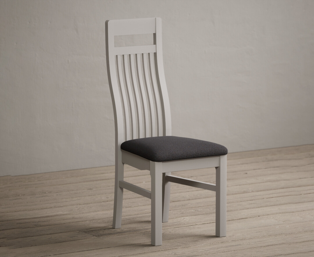 Product photograph of Monroe Soft White Painted Dining Chairs With Charcoal Grey Fabric Pad from Oak Furniture Superstore.