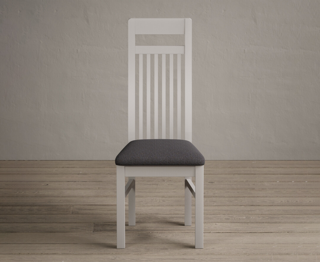 Product photograph of Monroe Soft White Painted Dining Chairs With Charcoal Grey Fabric Pad from Oak Furniture Superstore