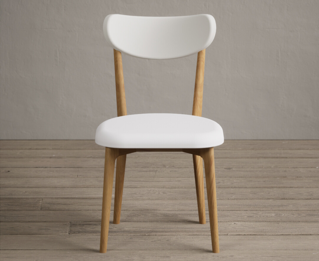 Product photograph of Nordic White Faux Leather Dining Chairs from Oak Furniture Superstore