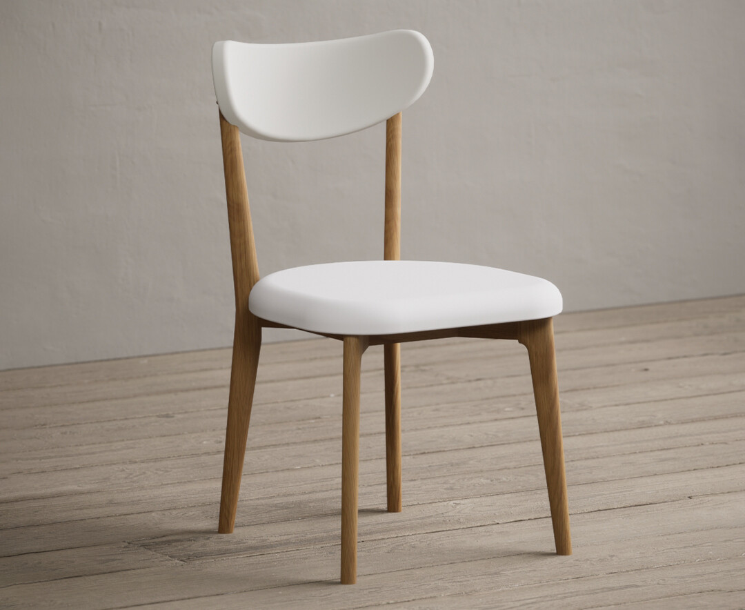 Photo 1 of Nordic white faux leather dining chairs