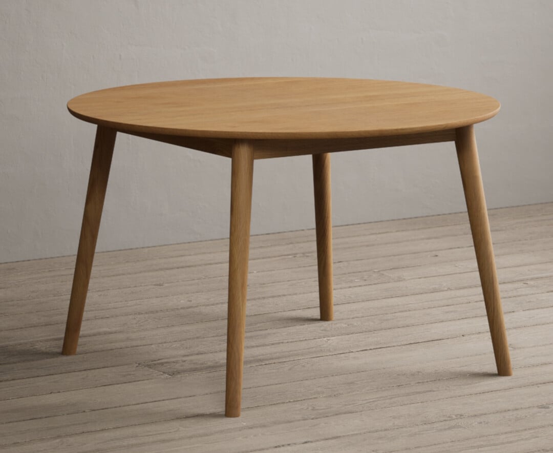 Product photograph of Nordic 120cm Round Solid Oak Dining Table from Oak Furniture Superstore