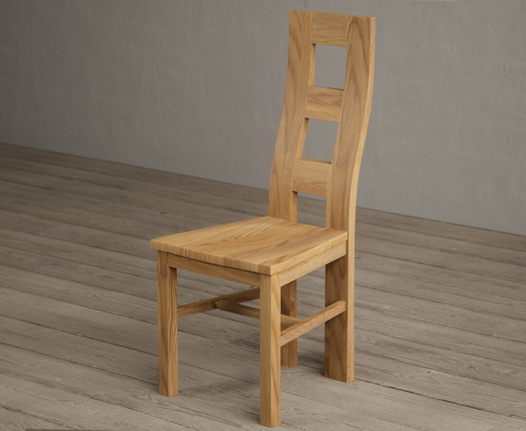 Photo 1 of Natural solid oak flow back dining chairs with oak seat pad