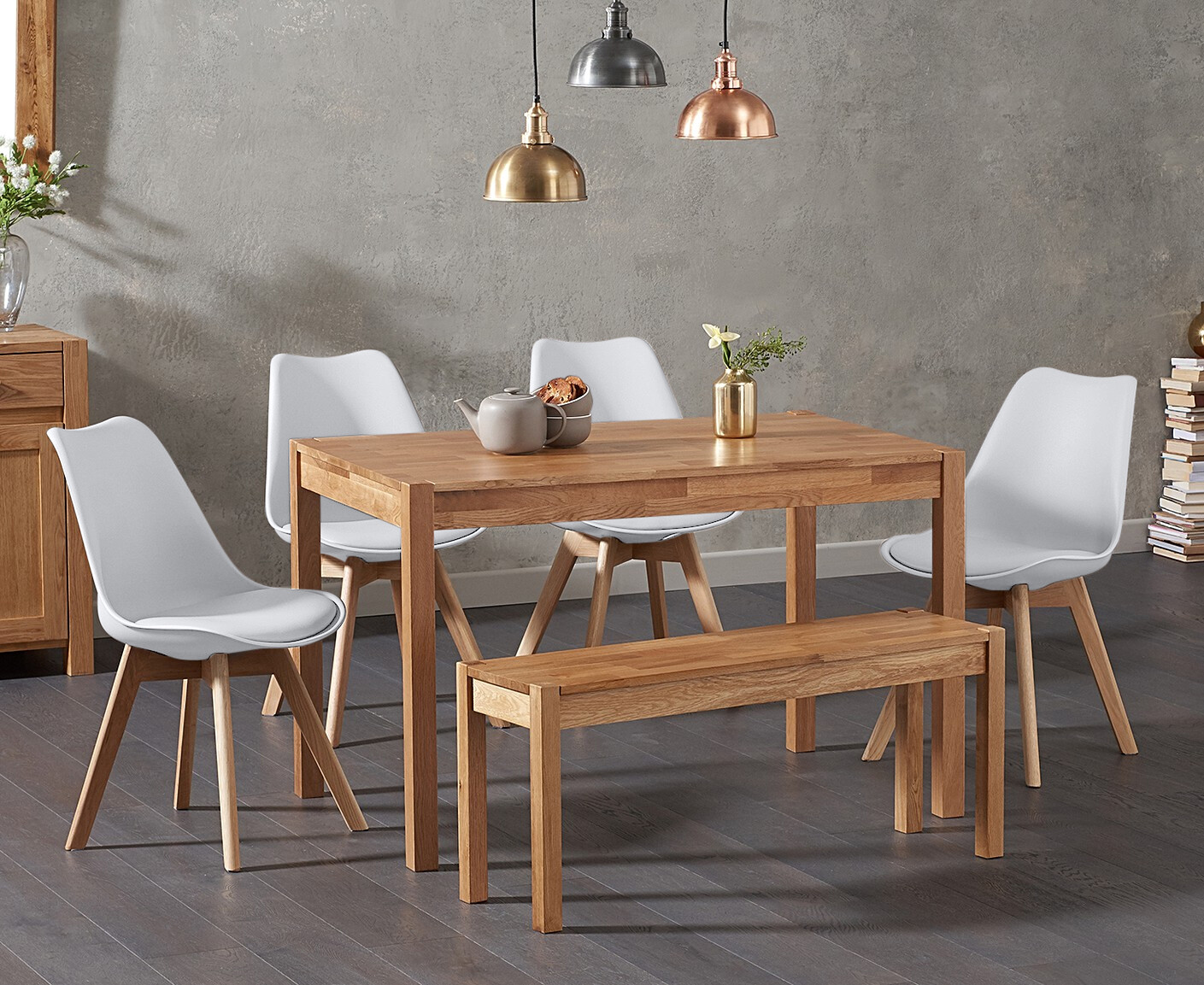 Product photograph of York 120cm Solid Oak Dining Table With 4 White Orson Faux Leather Chairs And 2 York Benches from Oak Furniture Superstore