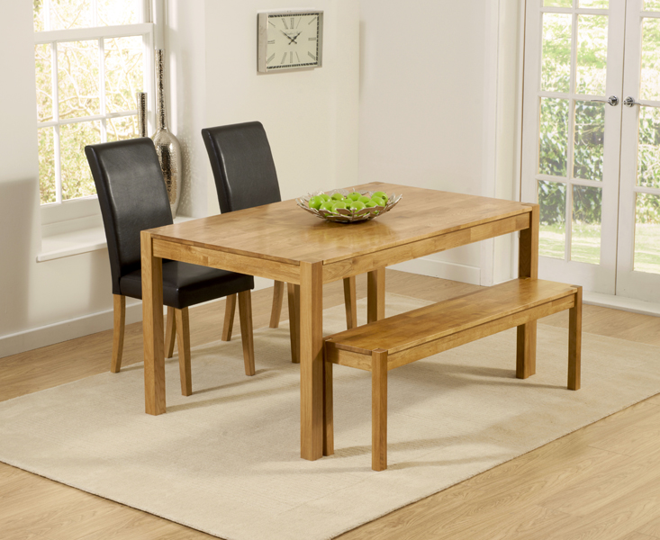 Photo 1 of York 150cm solid oak dining table with 4 black olivia chairs and 2 york bencheses