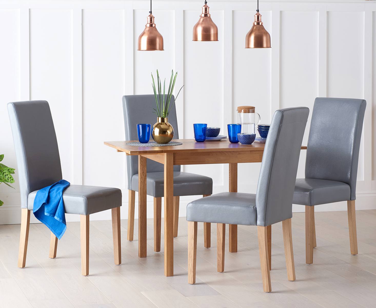 Product photograph of Extending York 70cm Solid Oak Dining Table With 2 Grey Olivia Chairs from Oak Furniture Superstore