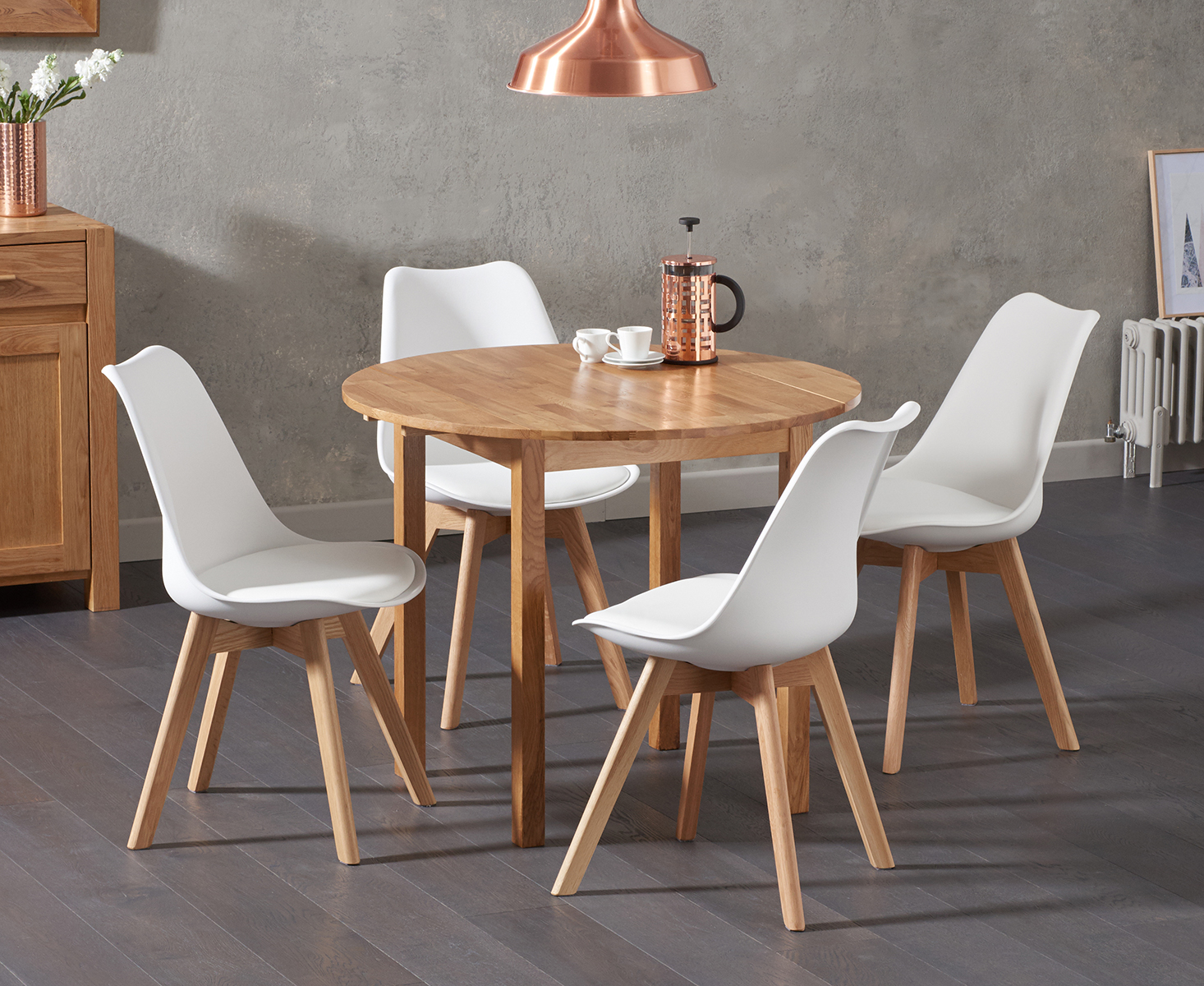 Product photograph of Extending York 90cm Solid Oak Drop Leaf Dining Table With 4 White Orson Faux Leather Chairs from Oak Furniture Superstore