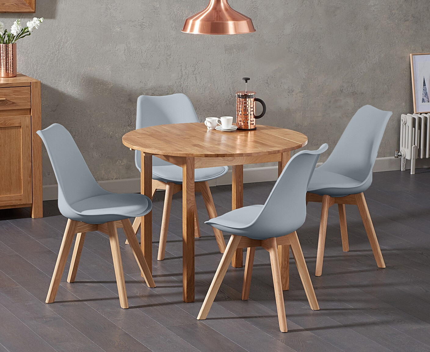 Product photograph of Extending York 90cm Solid Oak Drop Leaf Dining Table With 2 Light Grey Orson Faux Leather Chairs from Oak Furniture Superstore