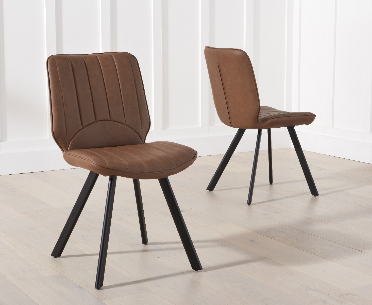 Product photograph of Hendrick Brown Faux Leather Dining Chairs from Oak Furniture Superstore