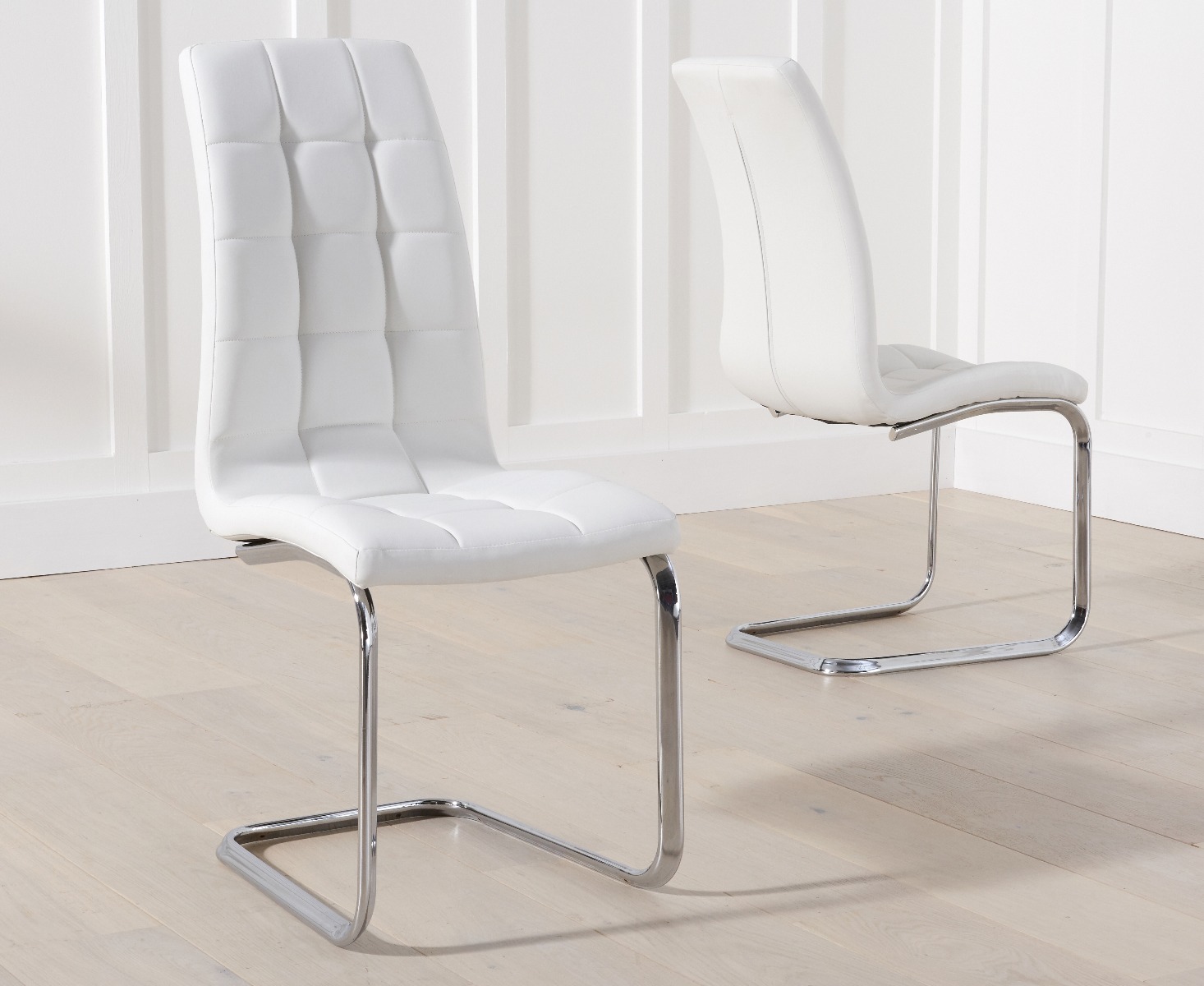 Photo 1 of Vigo white faux leather dining chairs