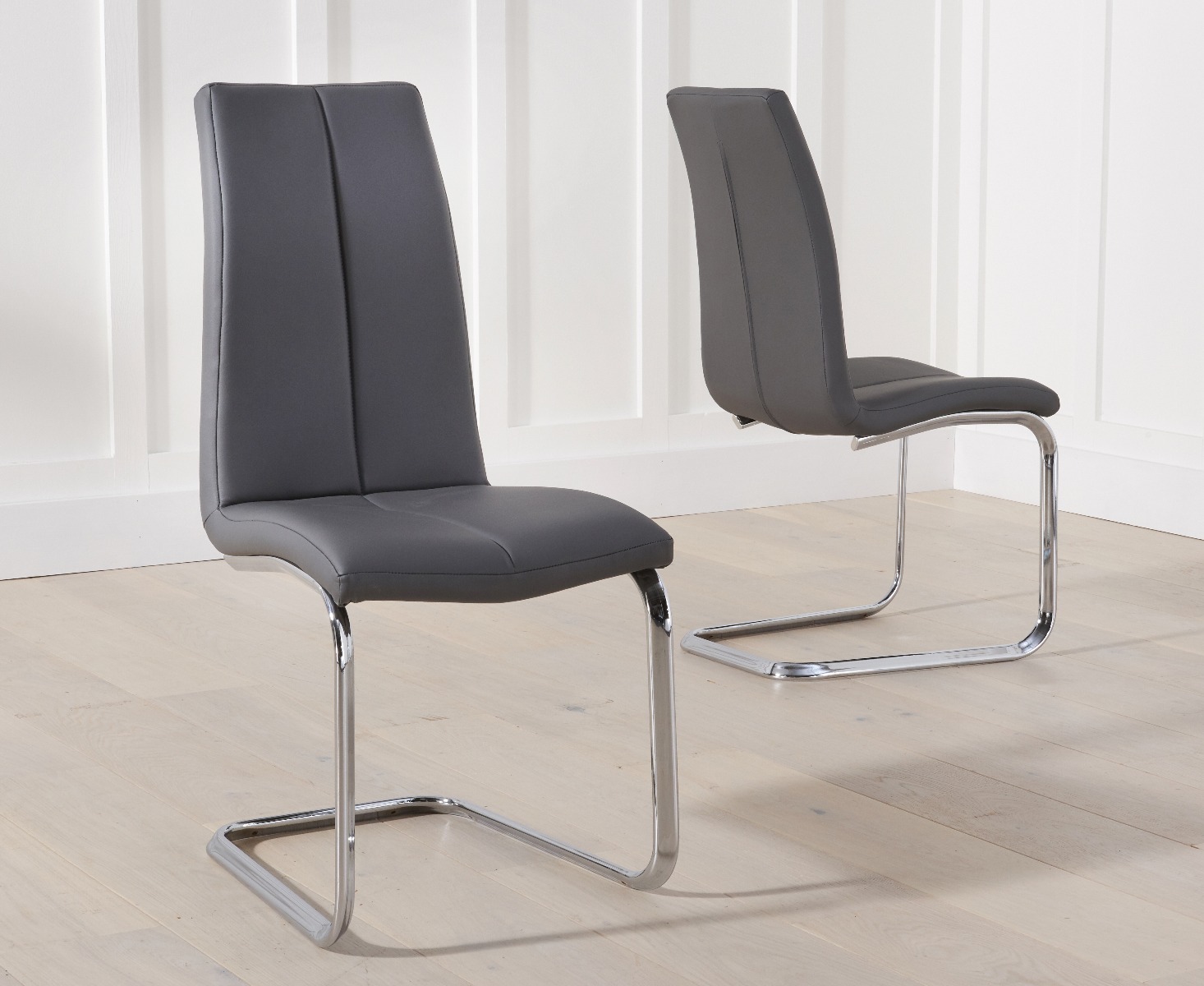 Product photograph of Gianni Grey Faux Leather Dining Chairs from Oak Furniture Superstore