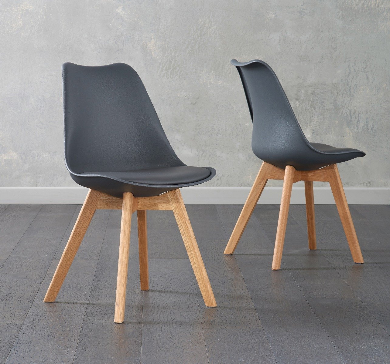 Orson Dark Grey Faux Leather Dining Chairs at Oak Furniture Superstore