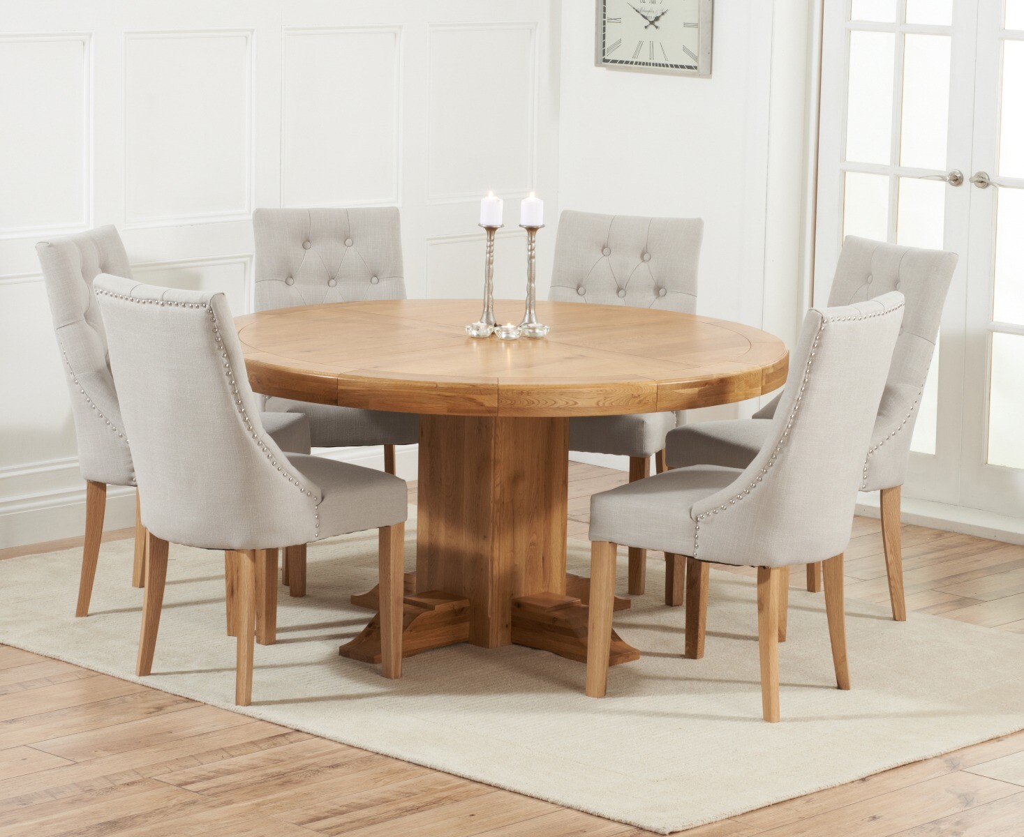 Product photograph of Helmsley 150cm Solid Oak Round Pedestal Dining Table With 4 Natural Beatrix Fabric Chairs from Oak Furniture Superstore