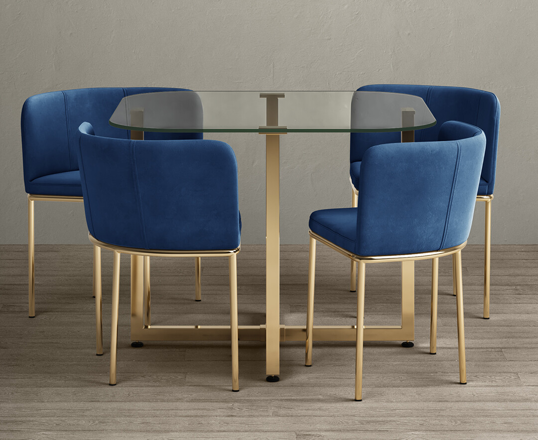 Product photograph of Rhodes Glass Stowaway Dining Table Gold Leg With Blue Velvet High Back Stools from Oak Furniture Superstore