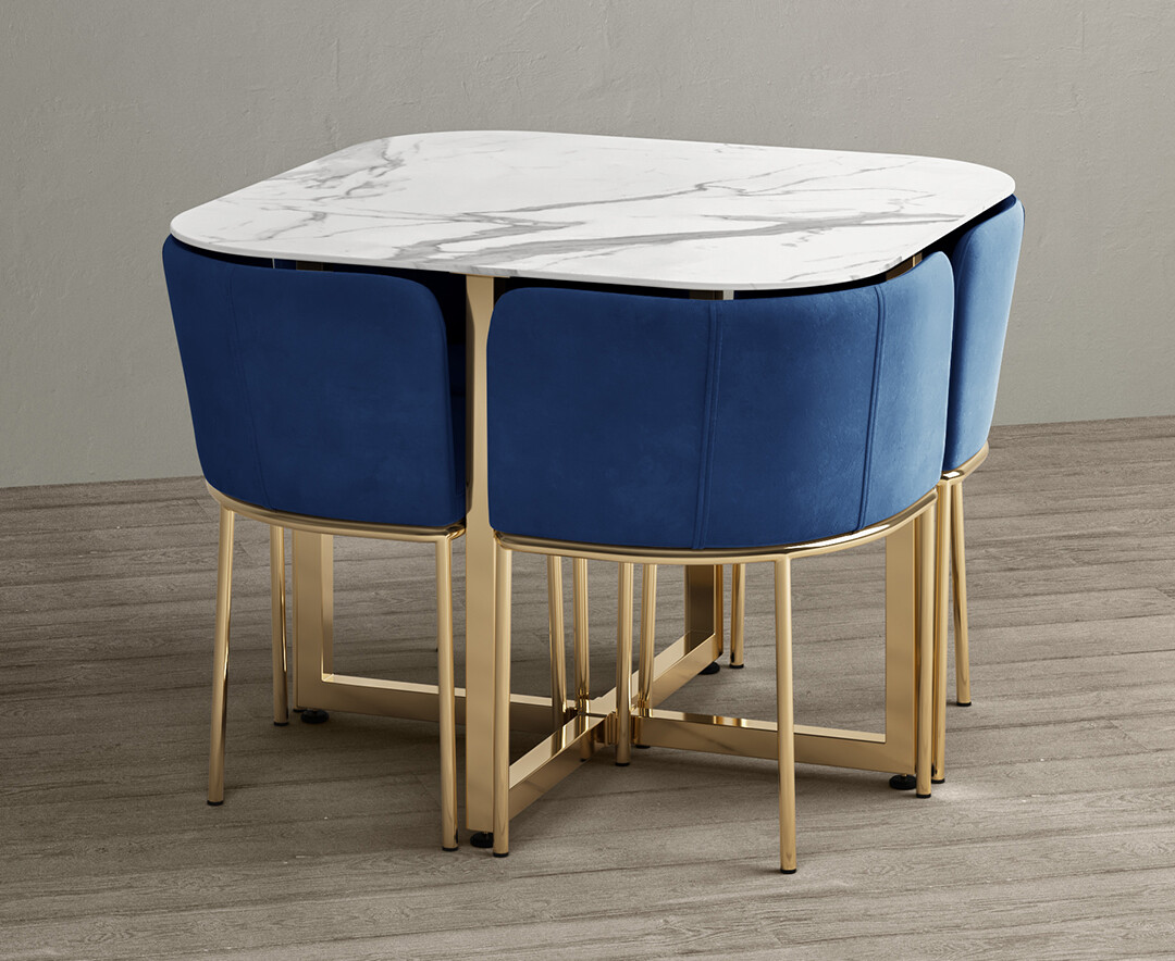Photo 1 of Rhodes white marble gold leg stowaway dining table with blue velvet gold leg high back stools