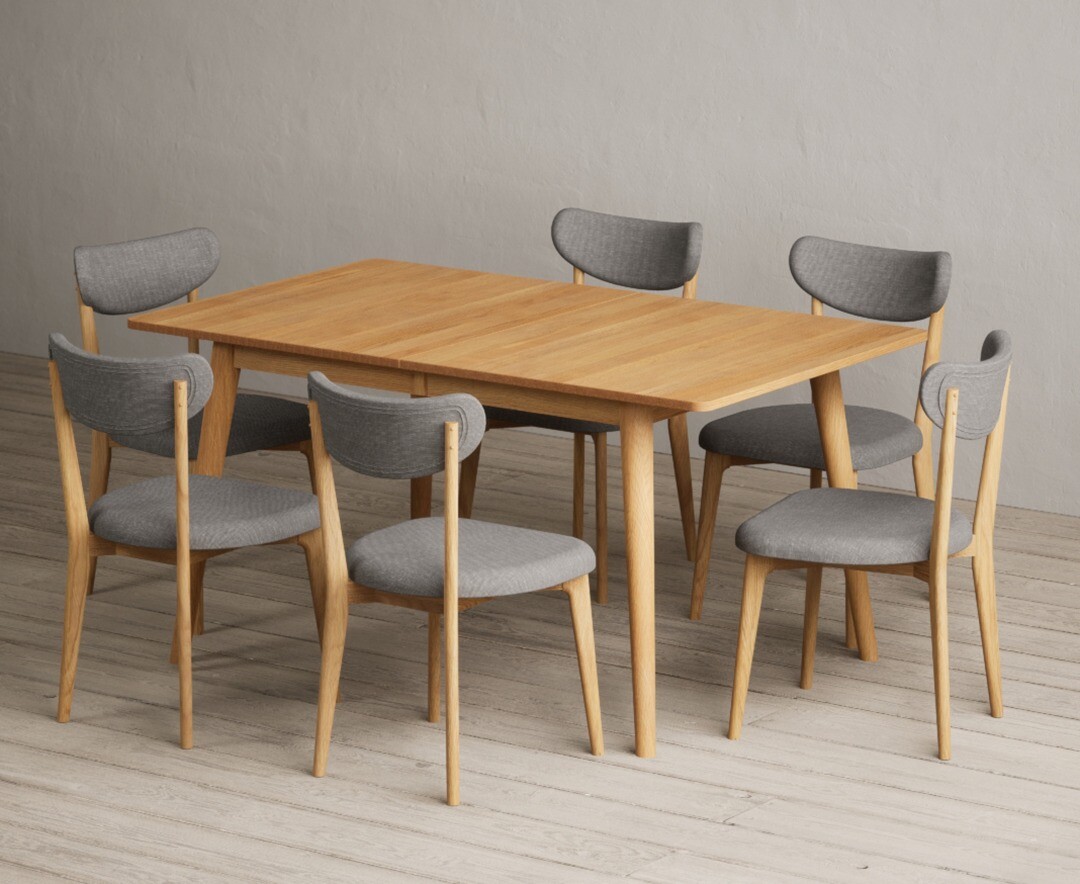 Product photograph of Extending Ruben 150cm Retro Oak Dining Table With 10 White Nordic Chairs from Oak Furniture Superstore