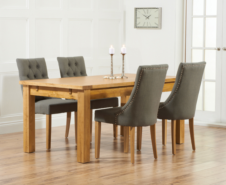 Photo 1 of Normandy 180cm solid oak extending dining table with 4 grey beatrix fabric chairs