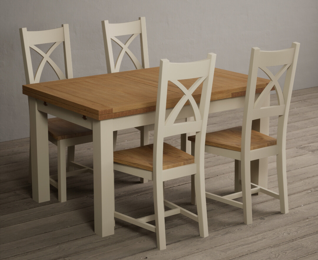 Photo 1 of Extending hampshire 140cm oak and cream painted dining table with 6 linen x back chairs