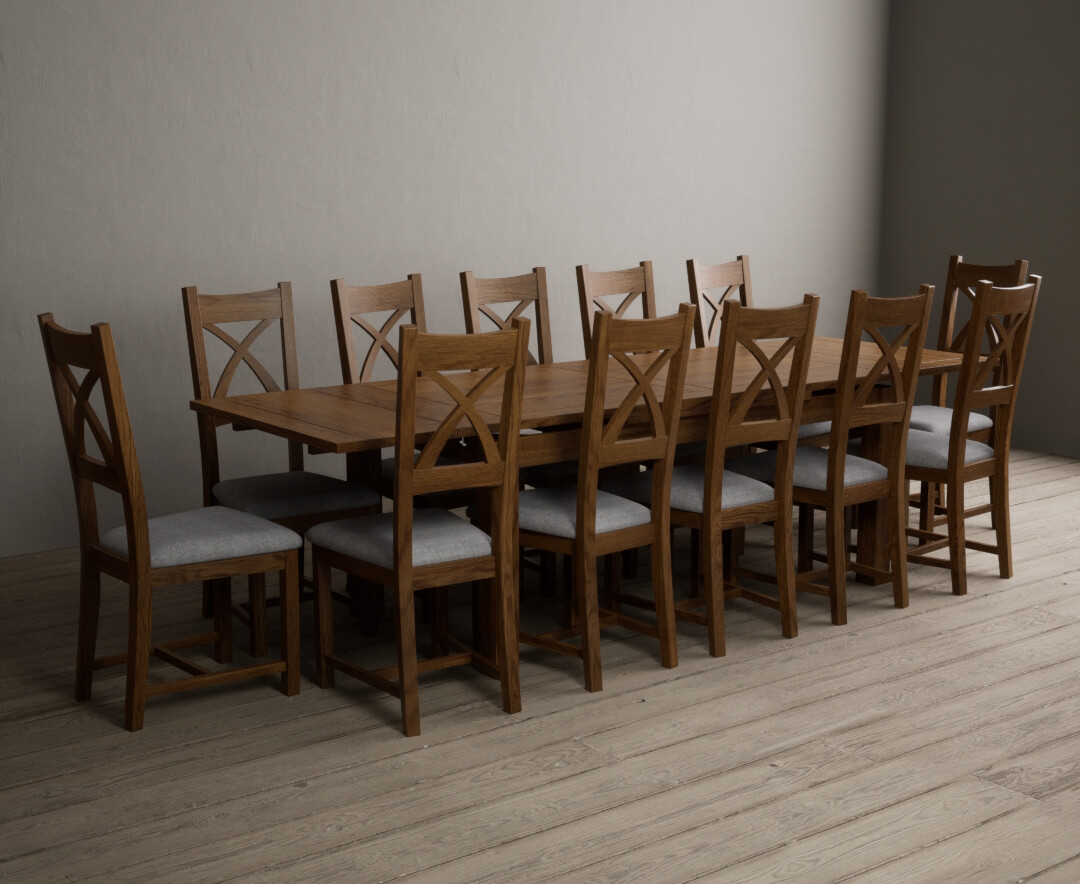 Photo 1 of Buxton 180cm rustic solid oak extending dining table with 12 light grey solid oak x back chairs