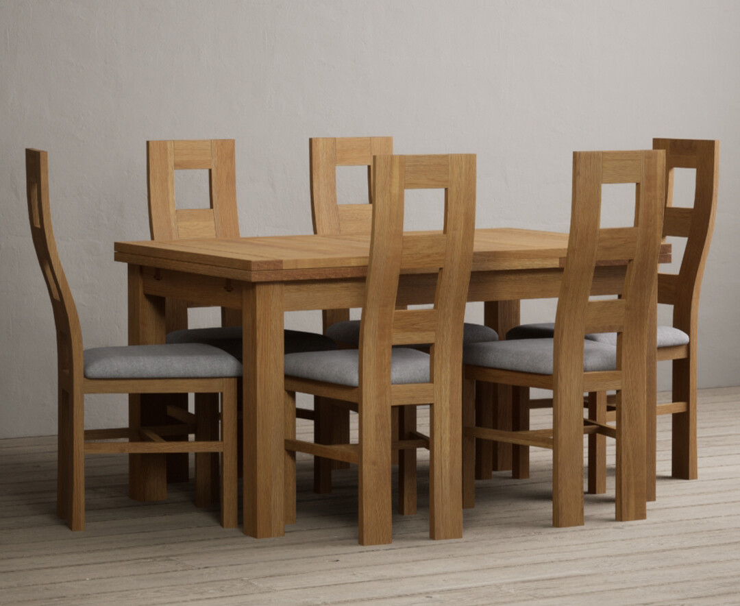 Photo 3 of Extending buxton 140cm solid oak dining table with 10 linen natural chairs