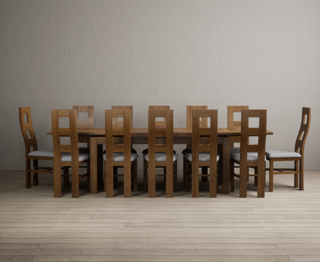 Product photograph of Extending Buxton 180cm Rustic Solid Oak Dining Table With 10 Rustic Oak Rustic Solid Oak Chairs from Oak Furniture Superstore