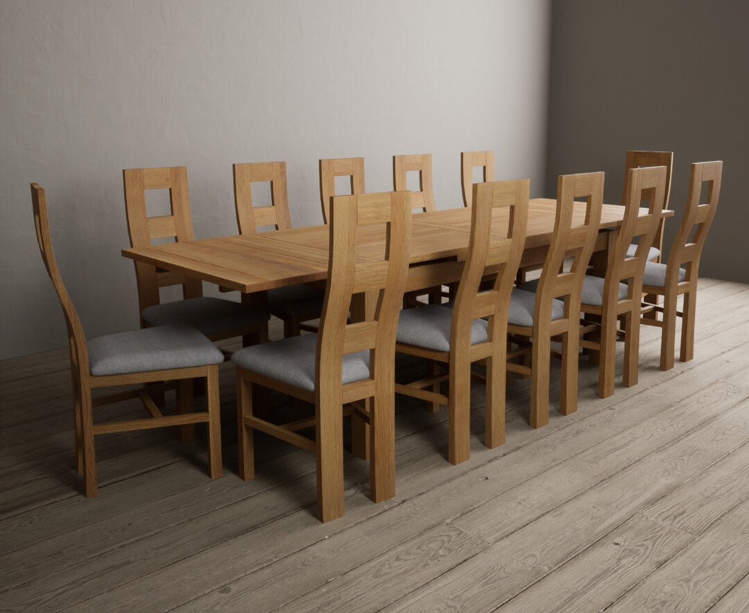 Photo 1 of Extending buxton 180cm solid oak dining table with 8 charcoal grey natural chairs