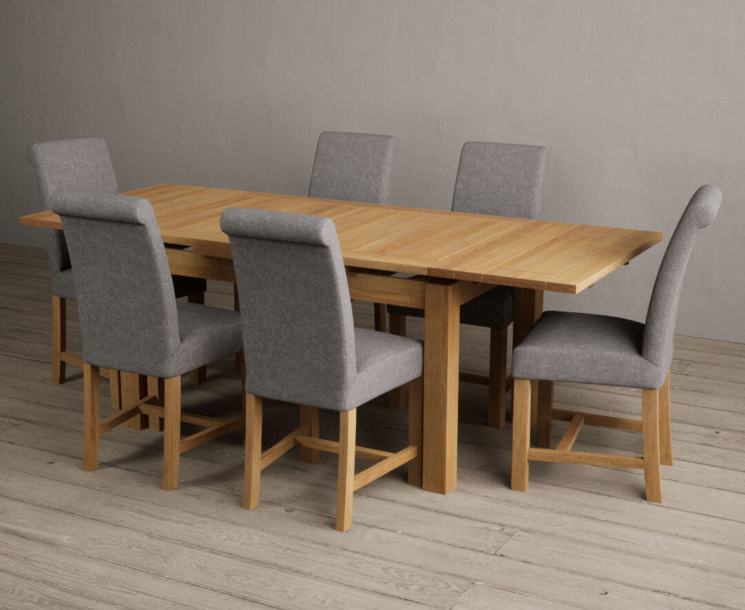 Photo 3 of Extending hampshire 140cm solid oak dining table with 8 blue braced leg chairs