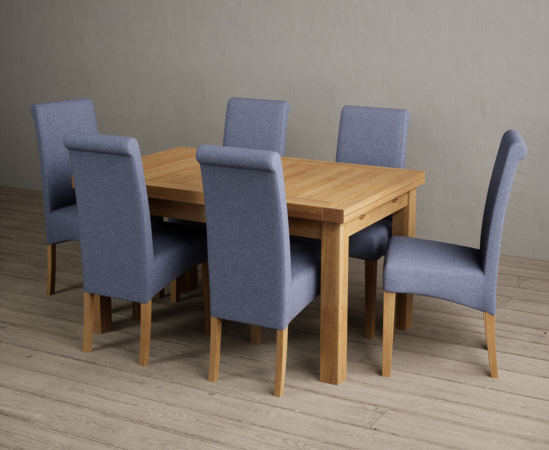 Photo 1 of Hampshire 140cm solid oak extending dining table with 8 blue scroll back chairs