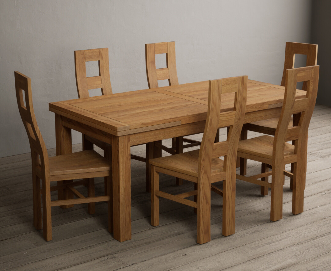 Photo 1 of Extending buxton 180cm solid oak dining table with 10 charcoal grey natural chairs