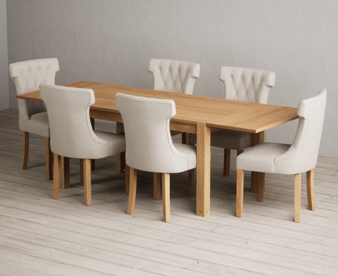 Product photograph of Thetford 150cm Oak Dining Table With Thetford 45cm Oak Extensions With 8 Grey Clara Chairs from Oak Furniture Superstore