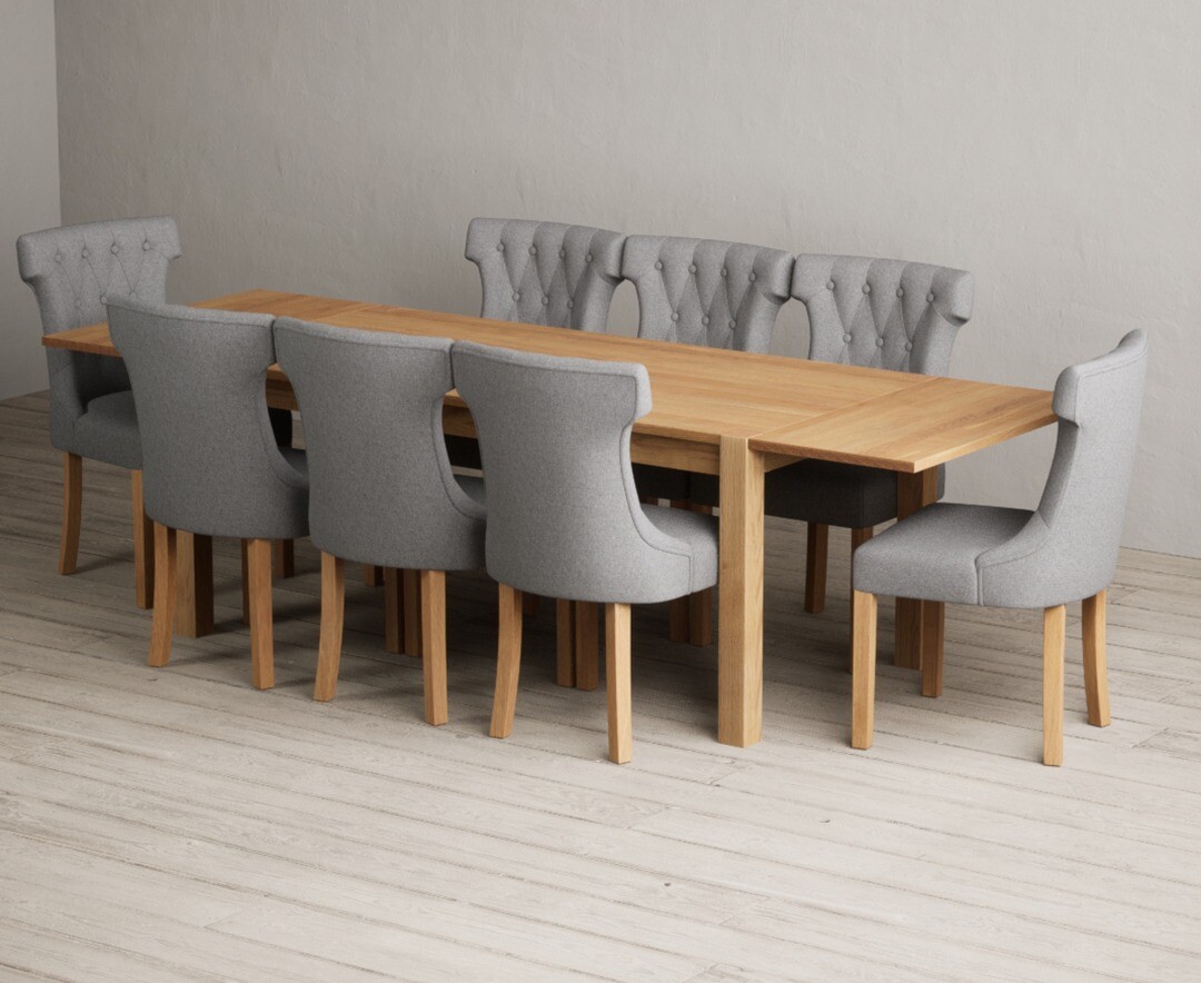 Product photograph of Thetford 180cm Oak Dining Table With 10 Natural Clara Chairs With Thetford 45cm Oak Extensions from Oak Furniture Superstore