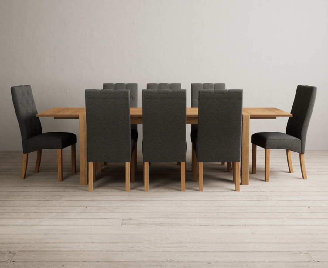 Product photograph of Thetford 180cm Oak Dining Table With 8 Grey Maya Chairs With Thetford 45cm Oak Extensions from Oak Furniture Superstore