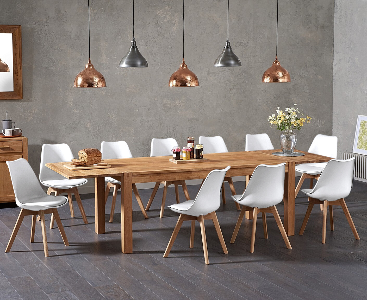 Product photograph of Extending Thetford 180cm Solid Oak Dining Table With 8 White Orson Faux Leather Chairs from Oak Furniture Superstore