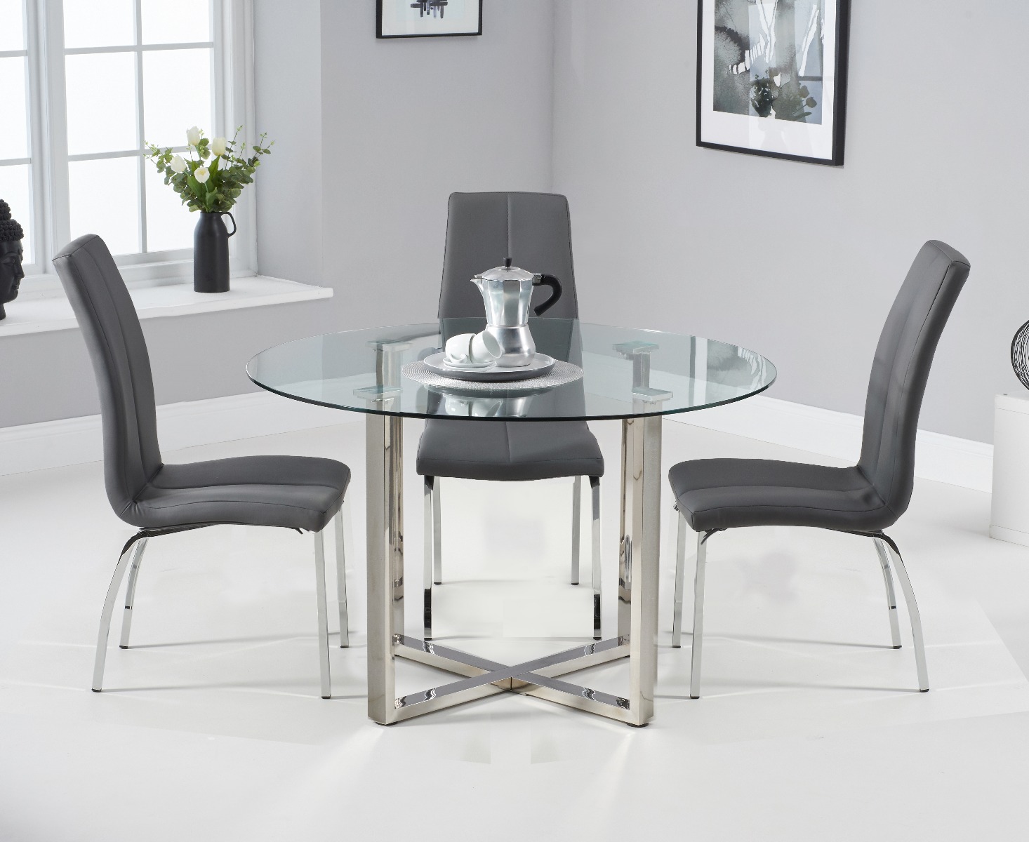 Product photograph of Vaso 120cm Round Glass Dining Table With 4 Grey Marco Chairs from Oak Furniture Superstore