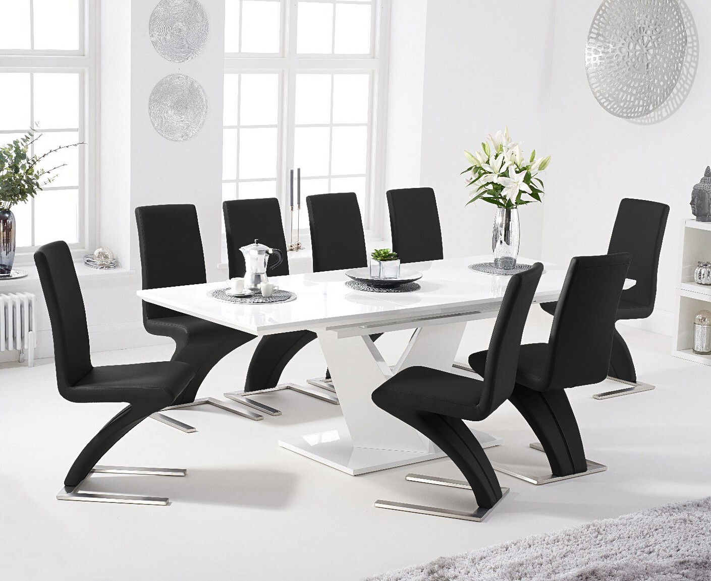 Product photograph of Extending Vittorio 160cm White High Gloss Dining Table With 4 Black Aldo Faux Leather Chairs from Oak Furniture Superstore