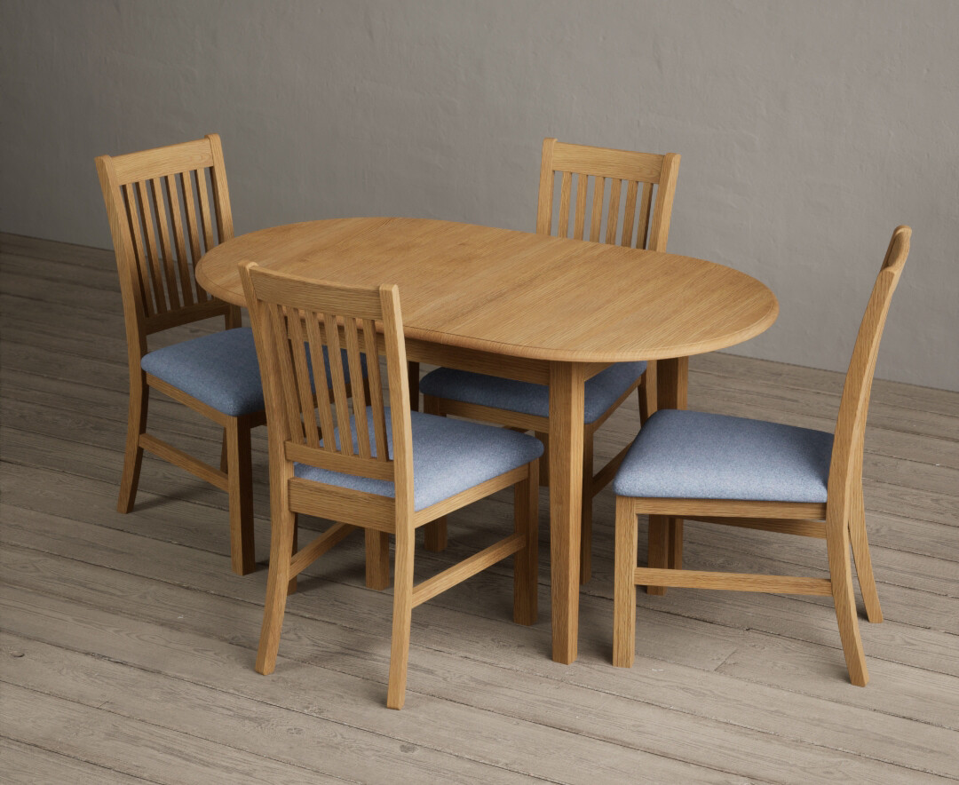 Photo 3 of Extending warwick solid oak dining table with 4 blue warwick chairs
