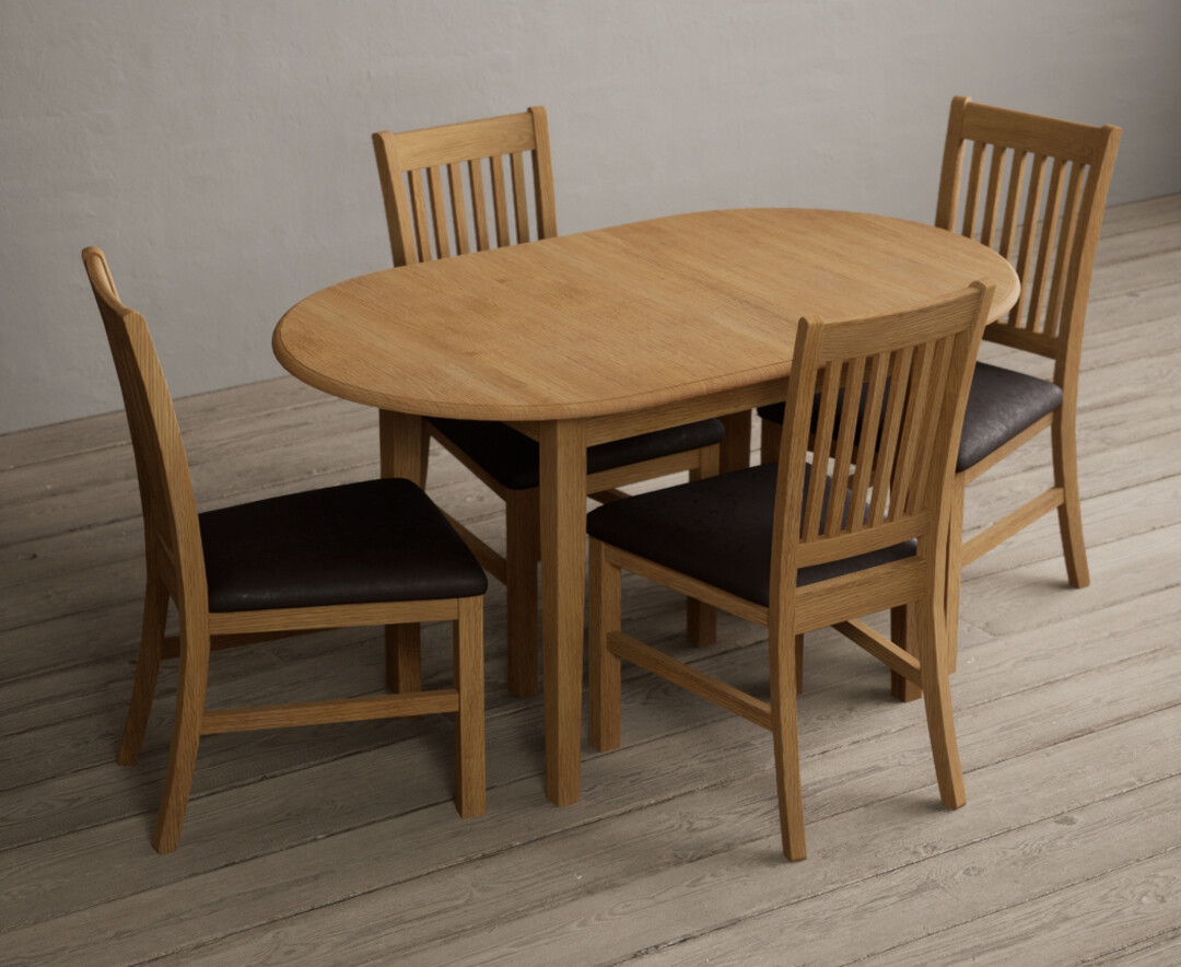 Photo 1 of Warwick solid oak extending dining table with 4 brown warwick chairs