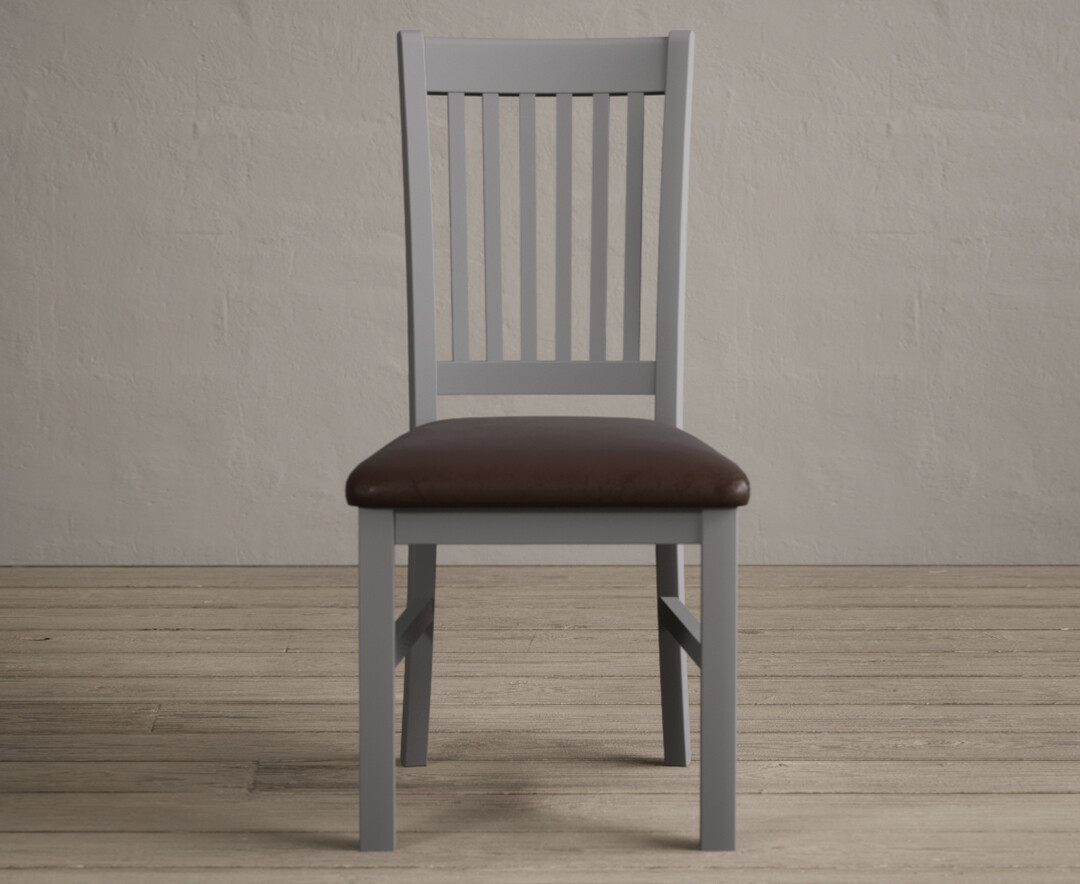 Product photograph of Warwick Light Grey Dining Chairs With Brown Suede Seat Pad from Oak Furniture Superstore