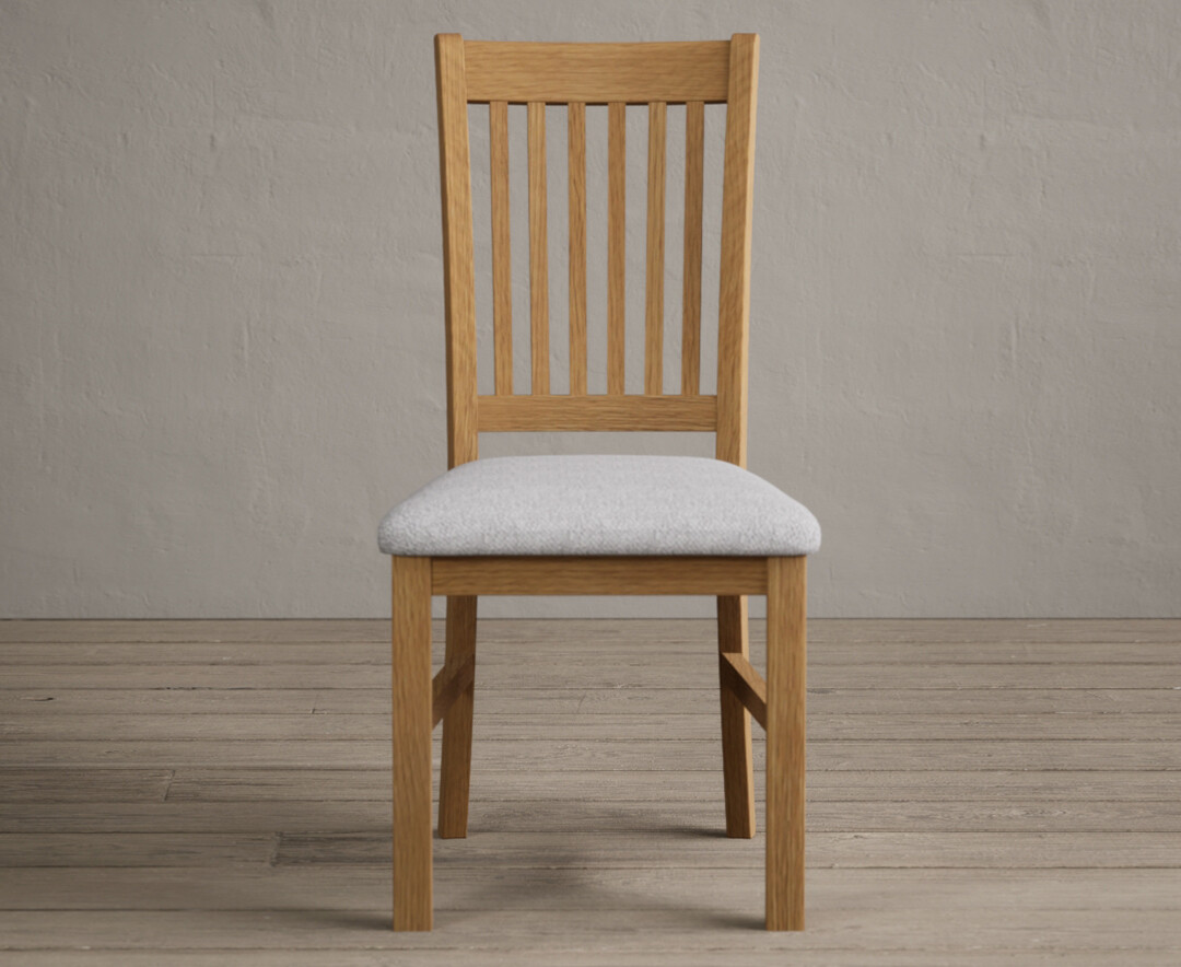 Product photograph of Warwick Solid Oak Dining Chair With Light Grey Fabric Seat Pad from Oak Furniture Superstore