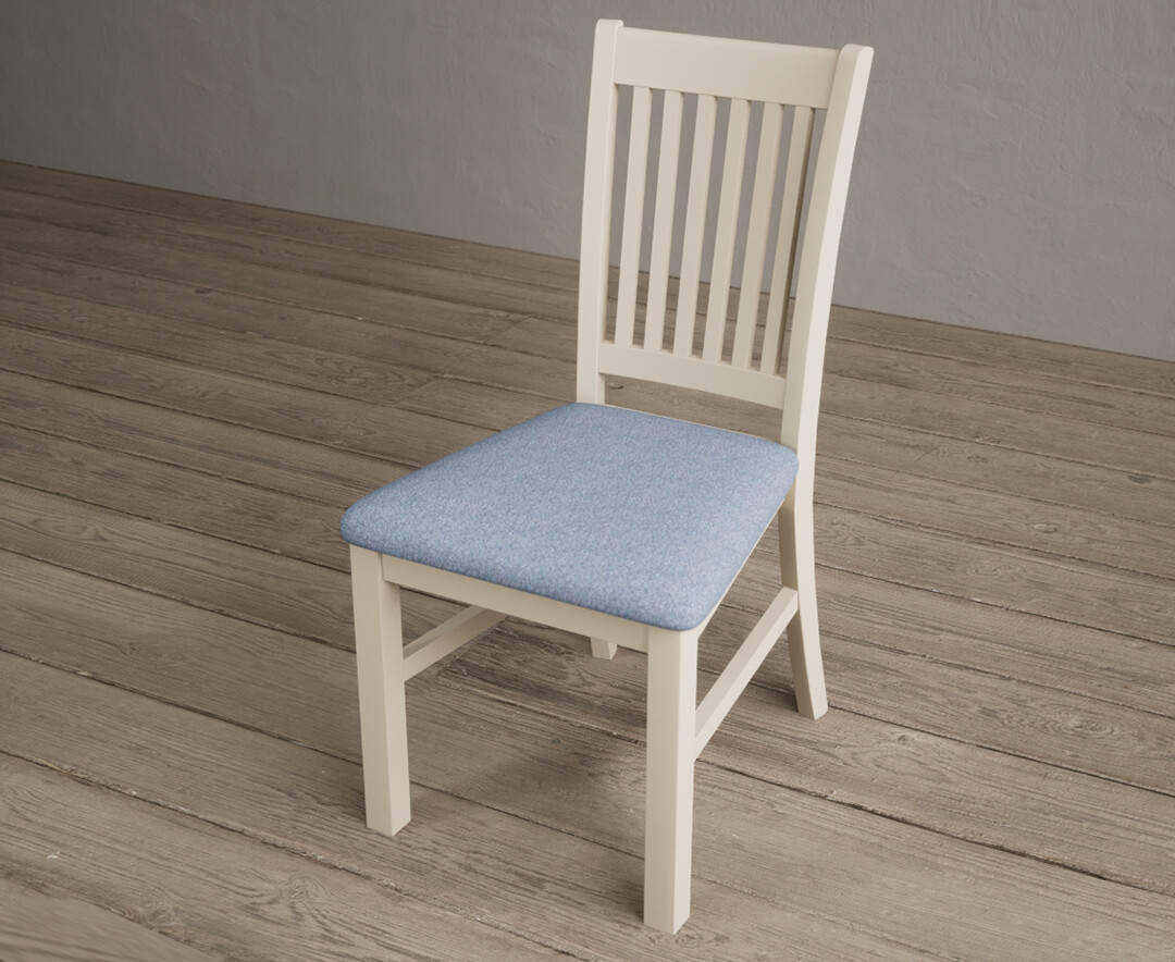Photo 2 of Warwick cream dining chairs with blue fabric seat pad