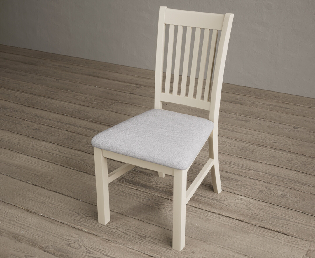 Photo 2 of Warwick cream dining chairs with light grey fabric seat pad
